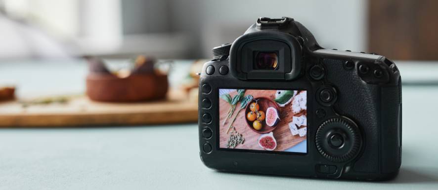 Kamera mit fotografierten Produkten Kamera mit fotografierten Produkten